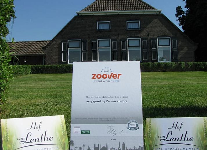 Cozy kitchen of Huisje in Dalfsen, vacation home in the Vecht region, Overijssel, with modern furnishings and cozy dining area.