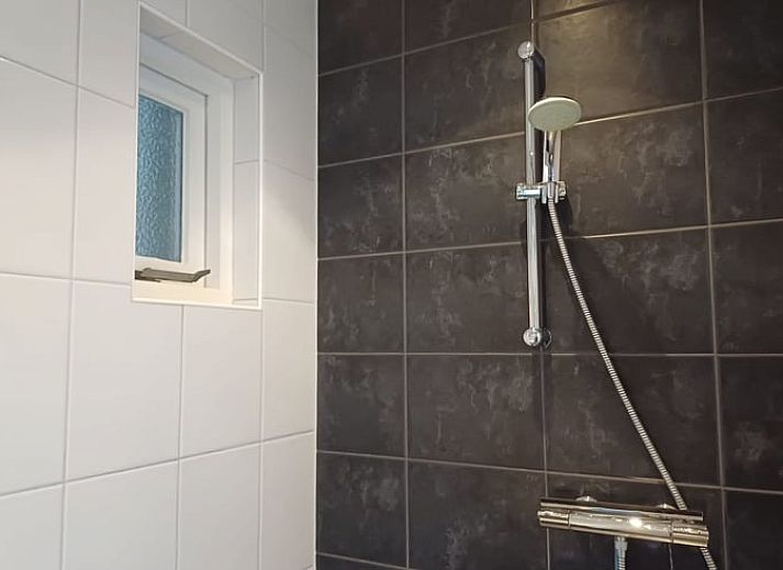 Prachtig uitzicht op de tuin vanuit Vakantiehuis in Dalfsen, een serene vakantiewoning in de Vechtstreek, Overijssel.