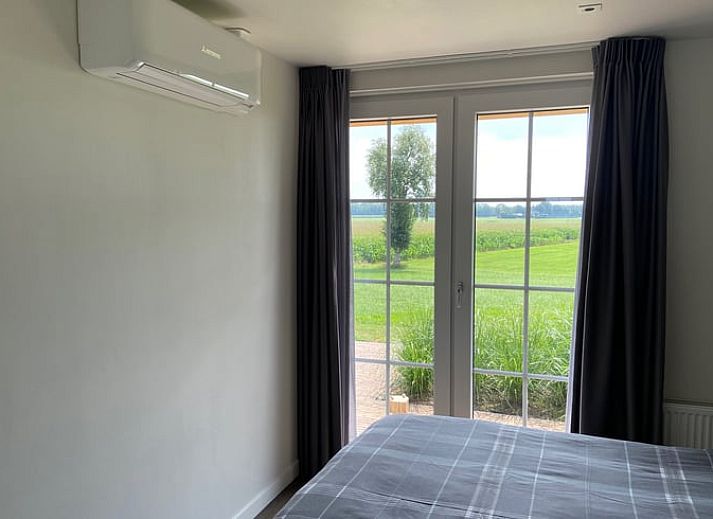 Cottage in Dalfsen with charming terrace and green garden, ideally located in the Vecht region, Overijssel for a relaxing stay.