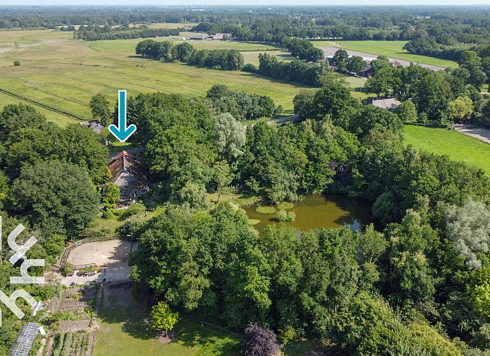Picturesque vacation home OV188 in Balkbrug, Vecht region, surrounded by dense forests and lush nature.
