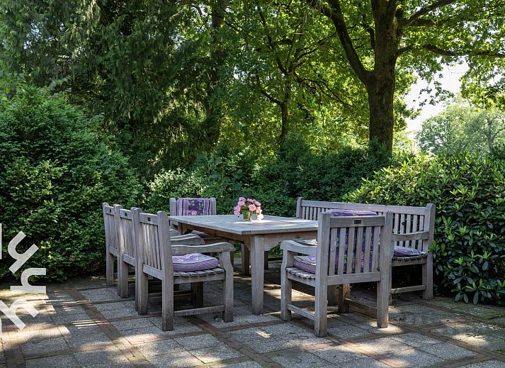 Attractive bedroom in OV188 vacation home, Balkbrug, Vechtstreek, with antique furniture and large windows.