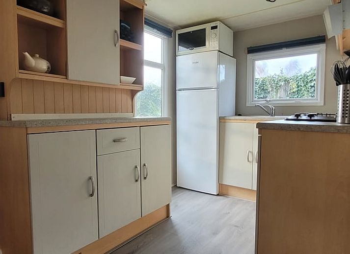 Ruime woonkamer van Vakantiehuis in Balkbrug, ideaal voor ontspanning.