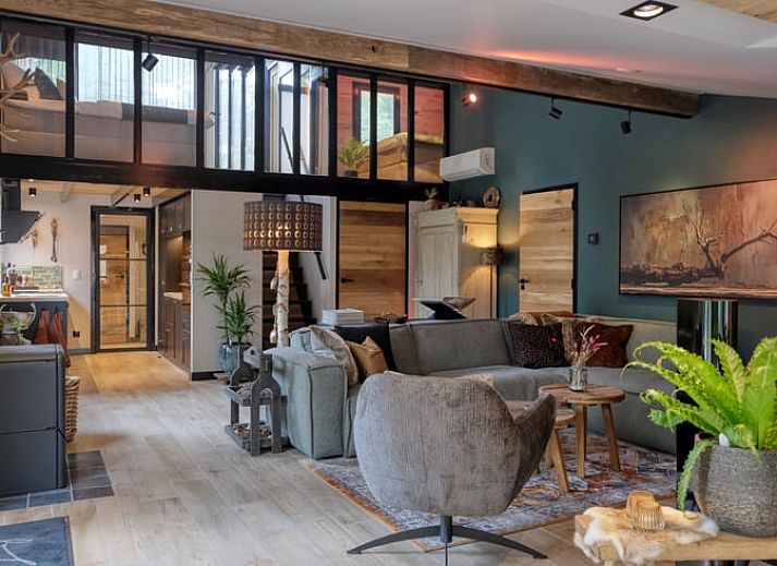 Exterior of Cottage in Rheezerveen, Vecht region, Overijssel with atmospheric lighting in the evening.