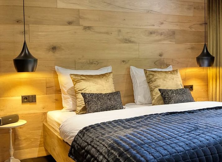 Bubbling hot tub in the garden of cottage in Rheezerveen, Vechtstreek, Overijssel surrounded by nature.