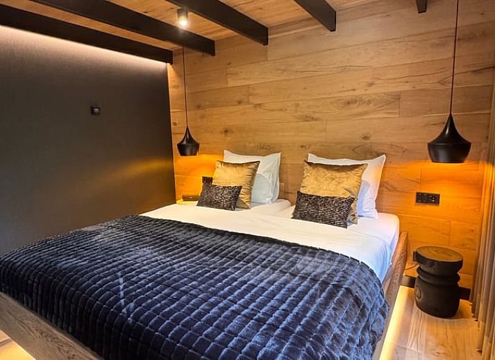 Bubbling hot tub in the garden of cottage in Rheezerveen, Vechtstreek, Overijssel surrounded by nature.