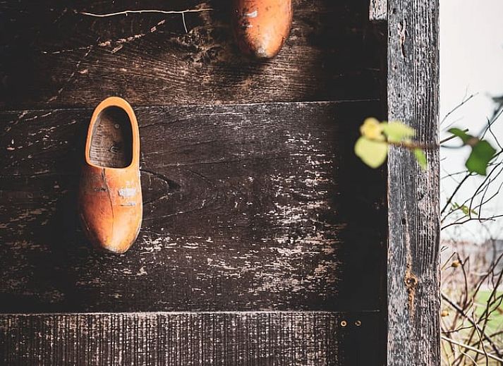 Attractive bedroom in Holiday cottage in Giethmen, Vechtstreek, Overijssel with wooden interior and comfortable beds.