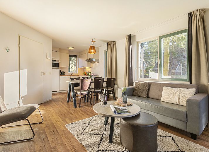 Light seating area in De Vlegge 6-person bungalow 6C2, Sibculo, Overijssel, ideal for relaxation.