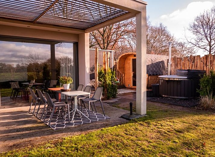 Relax on the veranda of Holiday home in Lemele, with jacuzzi and views of nature in the Vecht region, Overijssel.