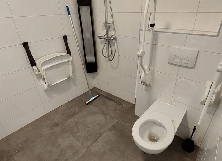 View from the terrace of Cottage in Radewijk over the green fields in the Vecht region.