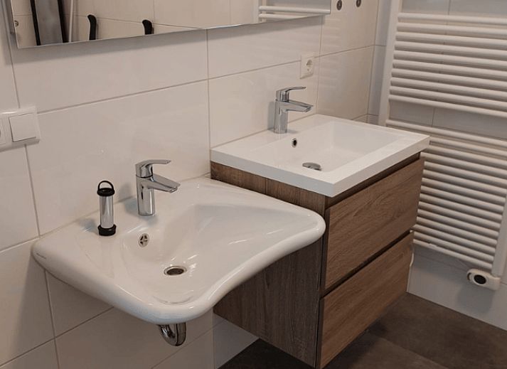 View from the terrace of Cottage in Radewijk over the green fields in the Vecht region.