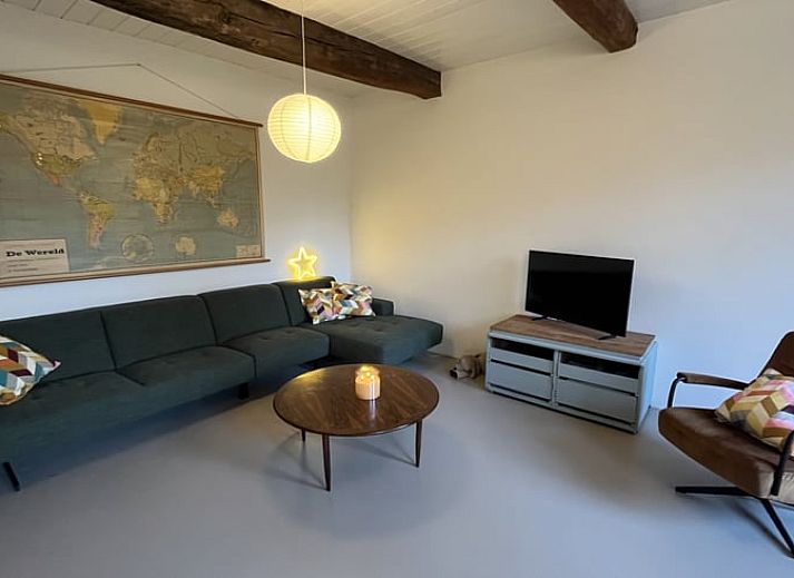 Cozy dining area in Holiday Home in Radewijk, Vechtstreek, Overijssel with wooden table.