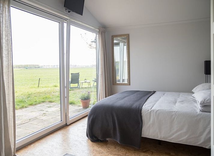 Comfortabele woonkamer in Vakantiehuisje in Stegeren, ideaal voor ontspanning in de Vechtstreek, Overijssel.