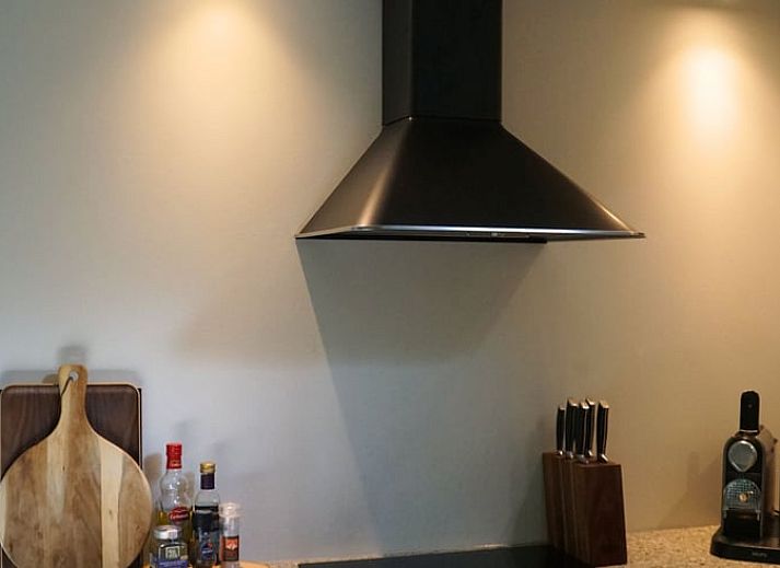 Knusse zithoek met houtkachel in Vakantiehuisje in Stegeren, Vechtstreek, Overijssel.