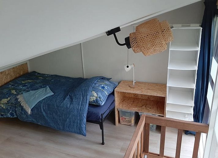 Das Ferienhaus in Stegeren liegt in der gruenen Natur der Region Vecht, Overijssel, und bietet einen ruhigen Rueckzugsort in einem bewaldeten Gebiet.