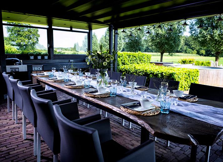 View of Holiday home in Hoonhorst at sunset, located in the Vecht region, Overijssel.