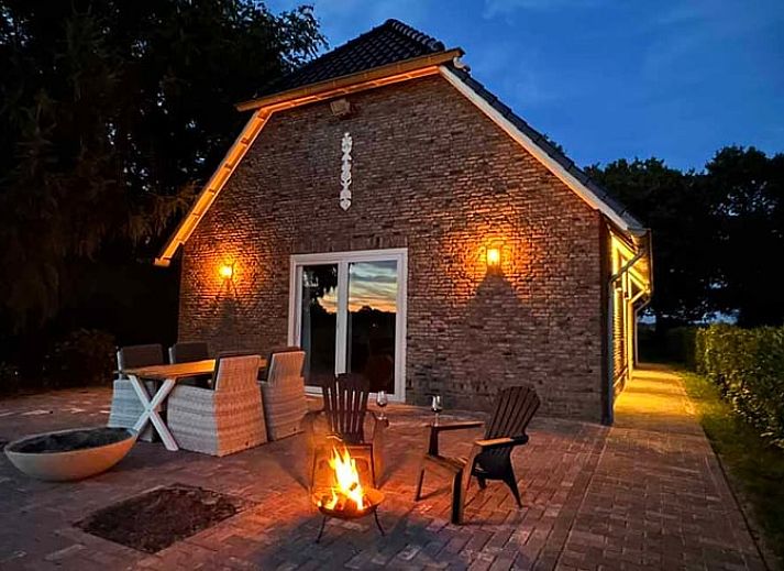 Atmospheric terrace at cottage in Kloosterhaar, Vechtstreek, Overijssel with evening lighting.