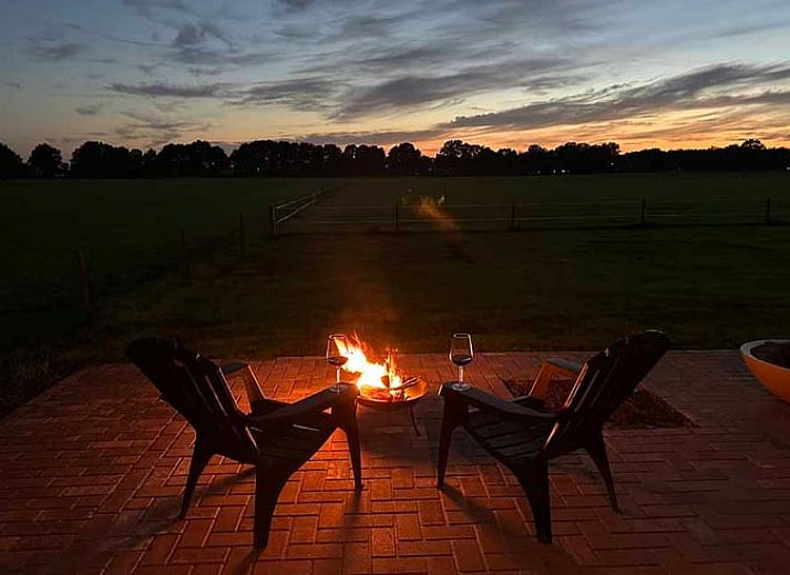 Atmospheric terrace at cottage in Kloosterhaar, Vechtstreek, Overijssel with evening lighting.