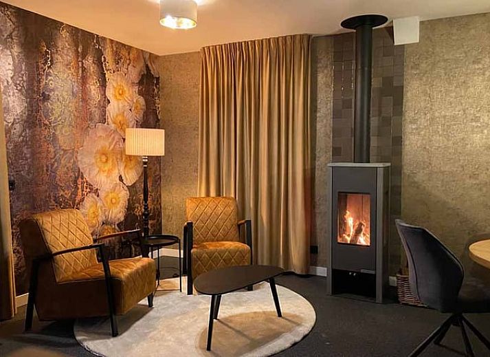 Atmospheric terrace at cottage in Kloosterhaar, Vechtstreek, Overijssel with evening lighting.