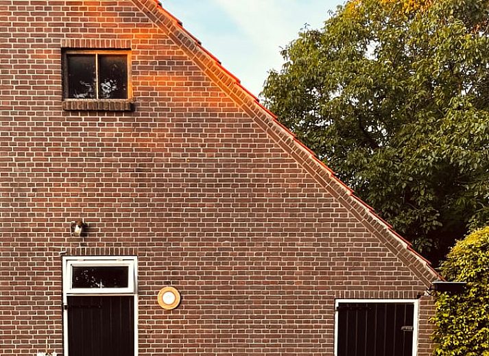 Cozy living room of cottage in Kloosterhaar, Vecht region Overijssel, with modern decor and lots of natural light.