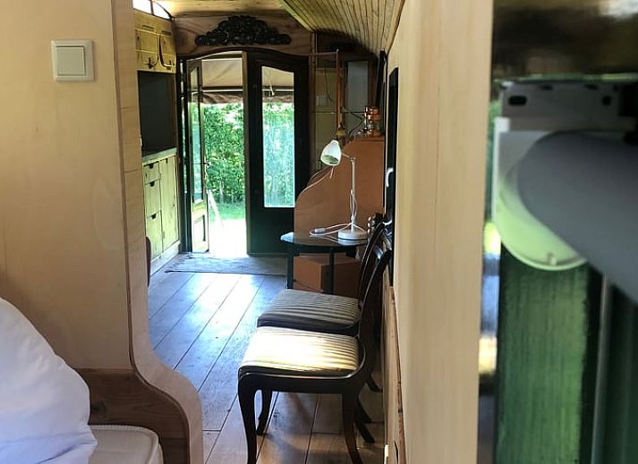 Huisje in Punthorst, vakantiehuis in Vechtstreek, Overijssel met terras aan het water.