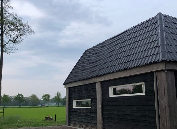 Gezellige woonkamer in Vakantiehuisje in Vinkenbuurt, Vechtstreek, Overijssel.
