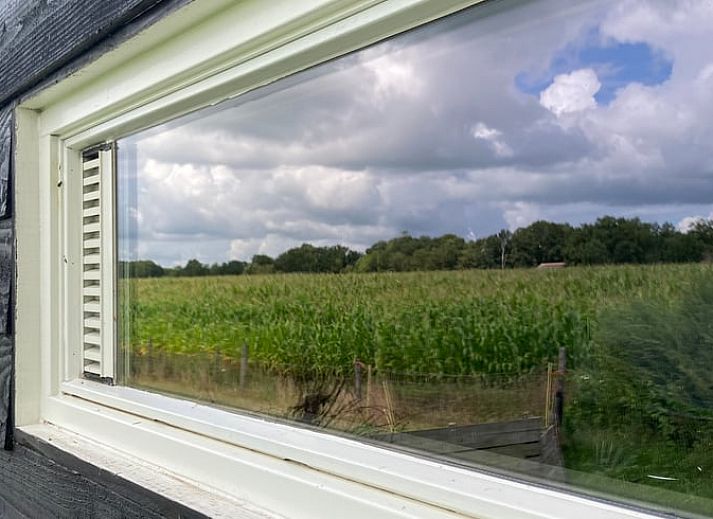 Gezellige woonkamer in Vakantiehuisje in Vinkenbuurt, Vechtstreek, Overijssel.