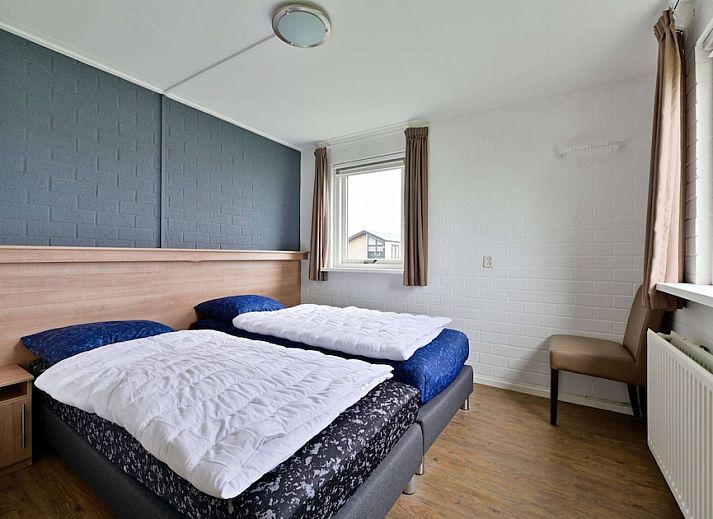 Gemuetliches Wohnzimmer im modern eingerichteten Bungalow De Wijde Blik 6 in Giethoorn, Overijssel. Ideales Ferienhaus zum Entspannen.