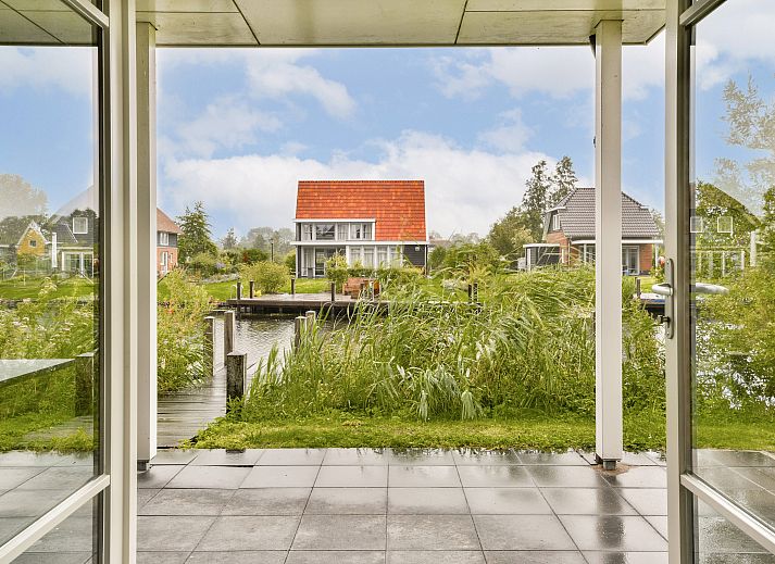 Vrijstaande woning in Giethoorn, een charmant vakantiehuis in het pittoreske Noordwest Overijssel, omgeven door weelderige natuur en rust.