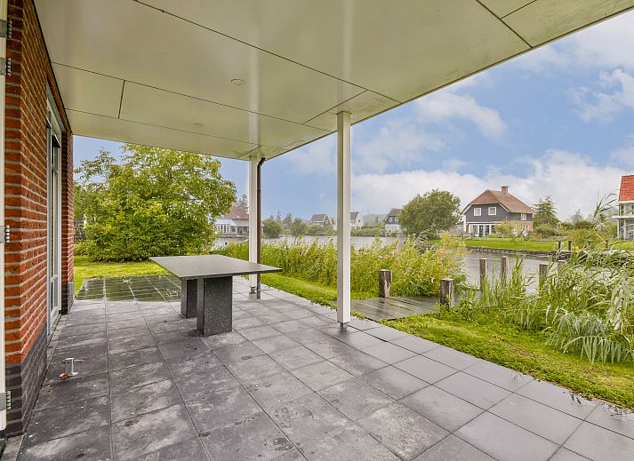 Vrijstaande woning in Giethoorn, een charmant vakantiehuis in Noordwest Overijssel, omgeven door schilderachtige natuur en rustige omgeving.