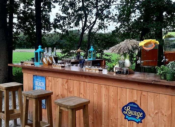 Enjoy a picnic by the water at Holiday Home in De Bult, Northwest Overijssel, with an attractive terrace and natural surroundings.