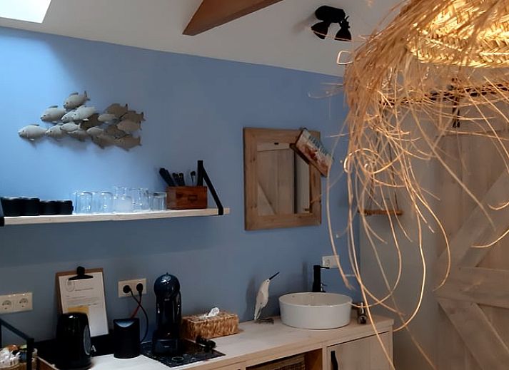 Enjoy a picnic by the water at Holiday Home in De Bult, Northwest Overijssel, with an attractive terrace and natural surroundings.