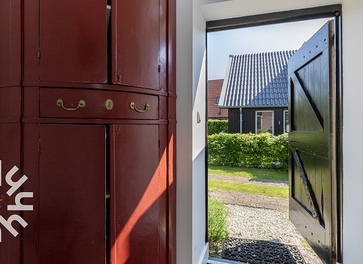 Riante tuin van vakantiehuis OV590 in Wanneperveen, Overijssel, met prachtig groen uitzicht.