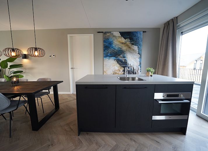 Chalet in Kampen, Northwest Overijssel, with modern architecture and green surroundings.