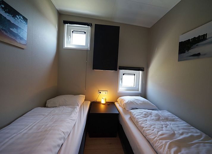 Modern bathroom in the detached house in Kampen, Overijssel, equipped with double sink and spacious mirror.