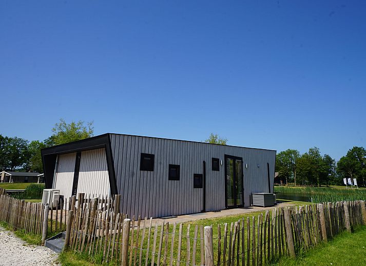 Modern bathroom in the detached house in Kampen, Overijssel, equipped with double sink and spacious mirror.