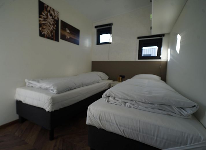 Vrijstaande woning in Kampen, een moderne vakantiewoning in Noordwest Overijssel met ruim terras en uitzicht op het groene landschap.