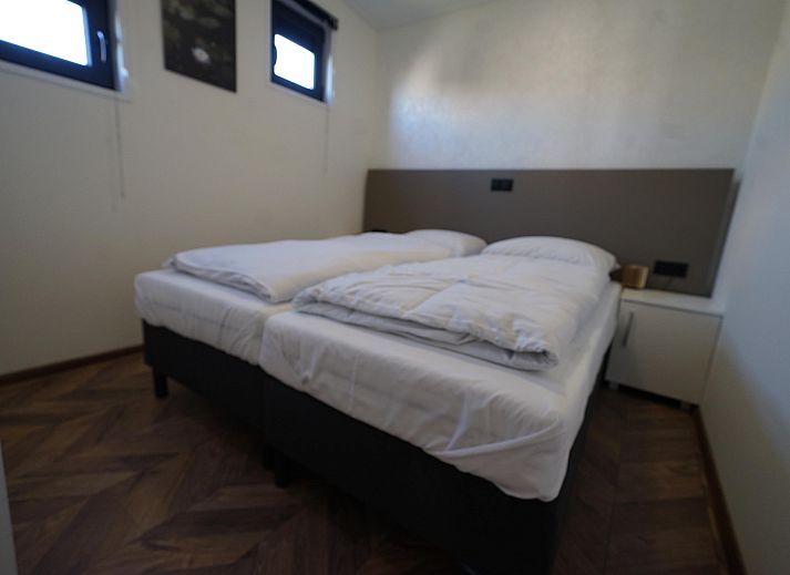 Gezellige woonkamer van de Vrijstaande woning in Kampen, Noordwest Overijssel. Comfortabel vakantiehuis met modern interieur en veel lichtinval.