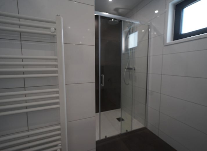 Gezellige woonkamer van de Vrijstaande woning in Kampen, Noordwest Overijssel. Comfortabel vakantiehuis met modern interieur en veel lichtinval.