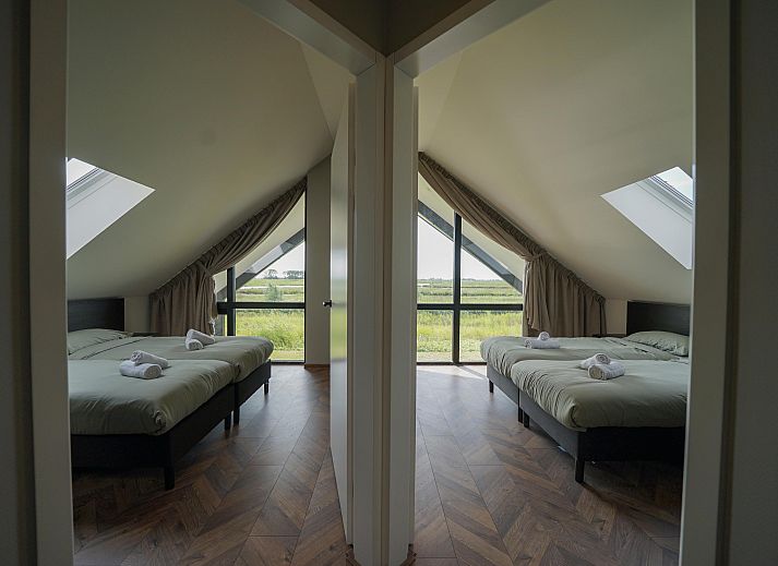 Detached house in Kampen, a vacation home in Northwest Overijssel, with a spacious veranda and beautiful views of the green surroundings.