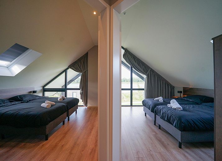 Vrijstaande woning in Kampen, Noordwest Overijssel, vakantiehuis met ruime tuin en moderne architectuur, ideaal voor ontspanning in de natuur.