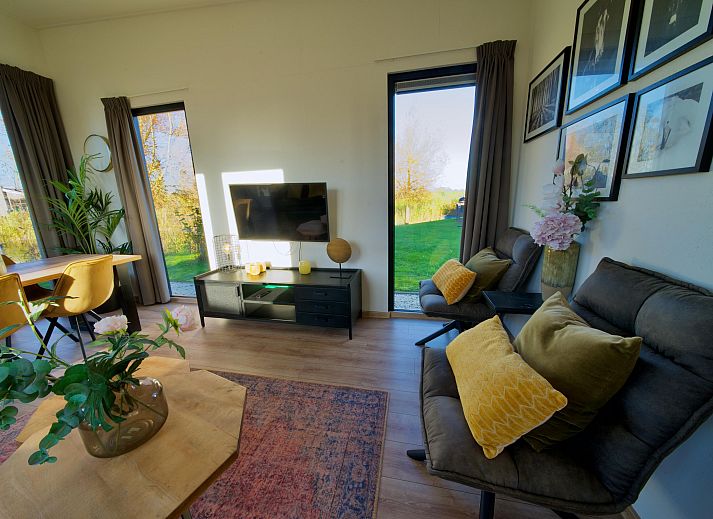 Vrijstaande woning in Kampen, Noordwest Overijssel, een modern vakantiehuis met terras en groene omgeving.