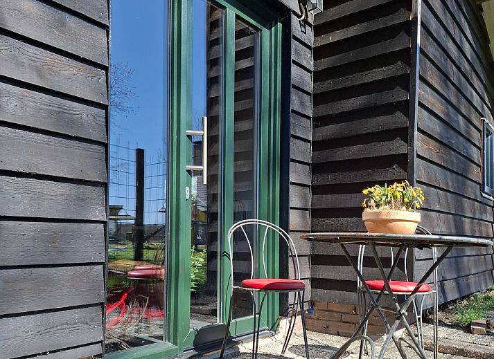 Gezellige binnenruimte van OV681 vakantiehuis in Steenwijk met comfortabele zithoek, Overijssel.