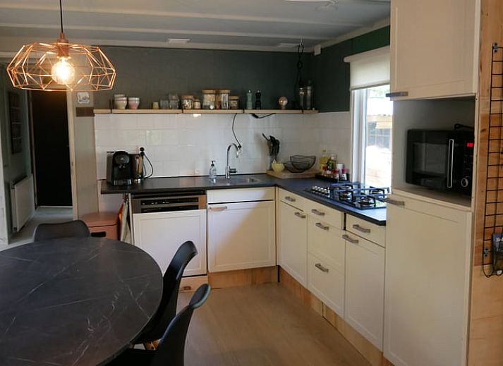 Exterior of Cottage in IJhorst, surrounded by green nature in Northwest Overijssel, Overijssel.