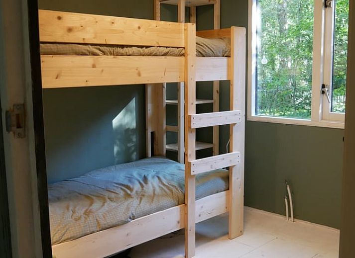 Cozy living room of cottage in IJhorst overlooking nature in Northwest Overijssel, Overijssel.