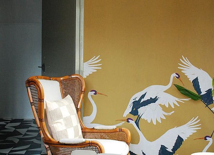 Cozy indoor area of Holiday Home in IJhorst, Overijssel with cozy sitting area and modern kitchen for a relaxing stay.