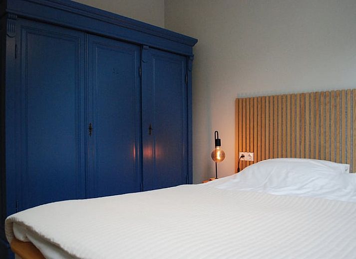 Modern kitchen in Holiday Home in IJhorst, Northwest Overijssel, with stylish tiles and practical furnishings for a comfortable stay.