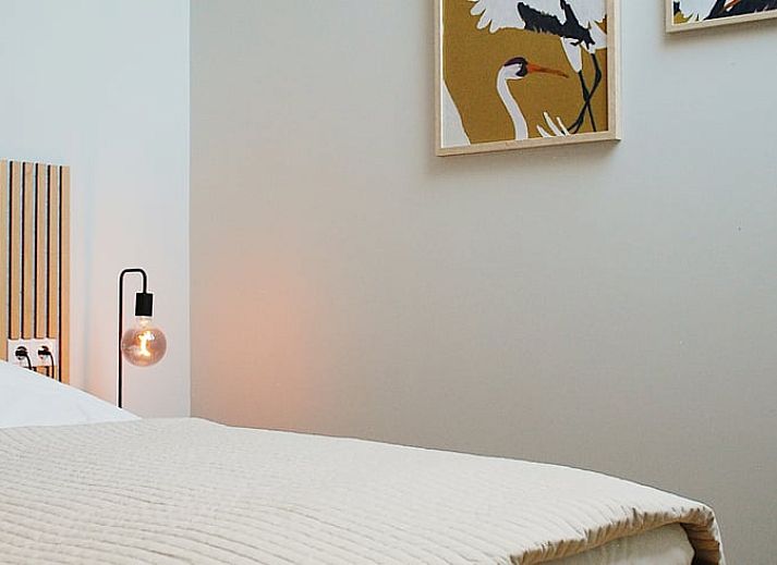 Modern kitchen in Holiday Home in IJhorst, Northwest Overijssel, with stylish tiles and practical furnishings for a comfortable stay.