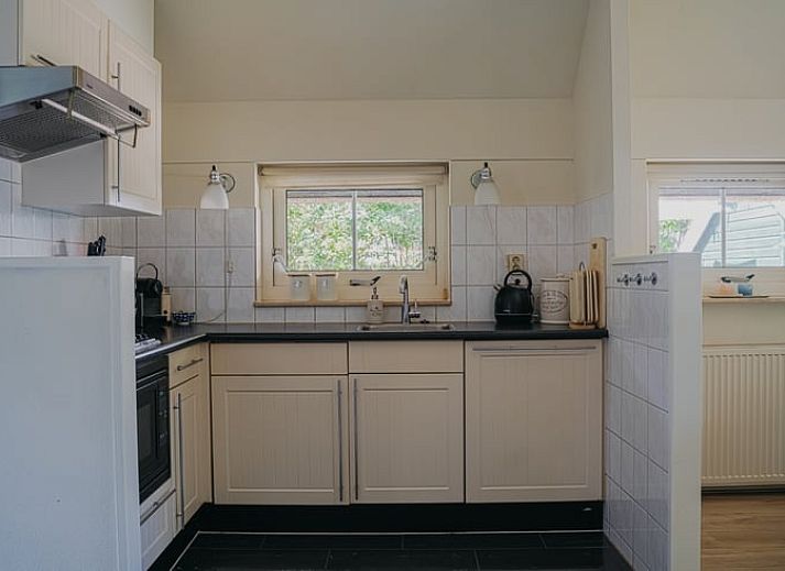 Gezellige zithoek op het terras van Vakantiehuisje in IJhorst, Noordwest Overijssel, Overijssel.