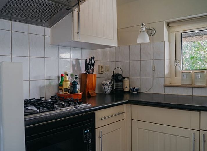 Gezellige zithoek op het terras van Vakantiehuisje in IJhorst, Noordwest Overijssel, Overijssel.