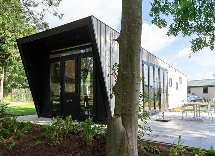 Detached house in IJhorst, a modern vacation home surrounded by nature in Northwest Overijssel, with a spacious veranda and green views.